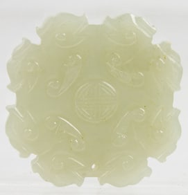 A Chinese celadon jade pendant