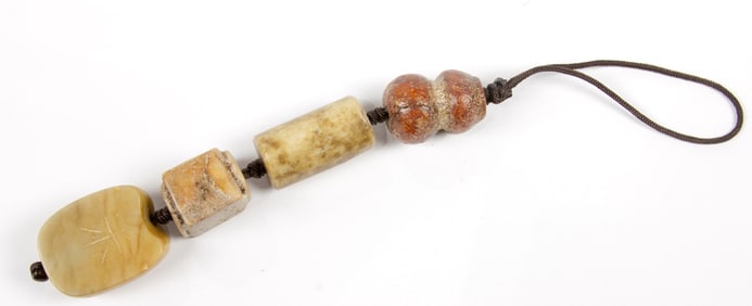 (lot of 4) Chinese archaistic stone beads