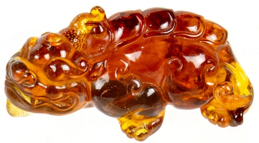 A Chinese amber mythical beast