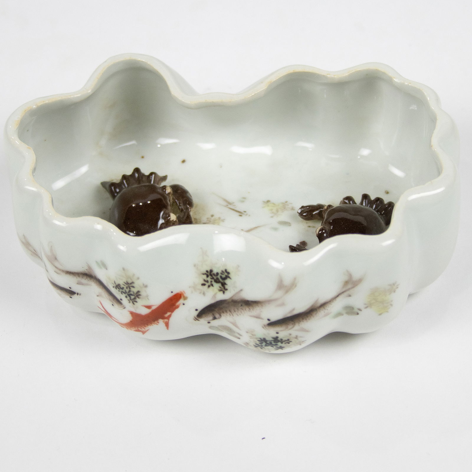 A Chinese enamel painted brush washer: A Chinese enamel painted brush washer. Featuring a pair of crabs and calligraphy, 5.75" across.