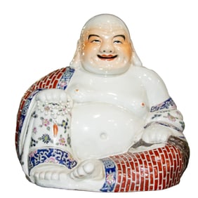 A Chinese famille rose Budai figure