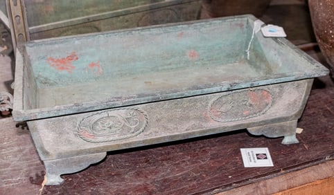 A bronze suiban