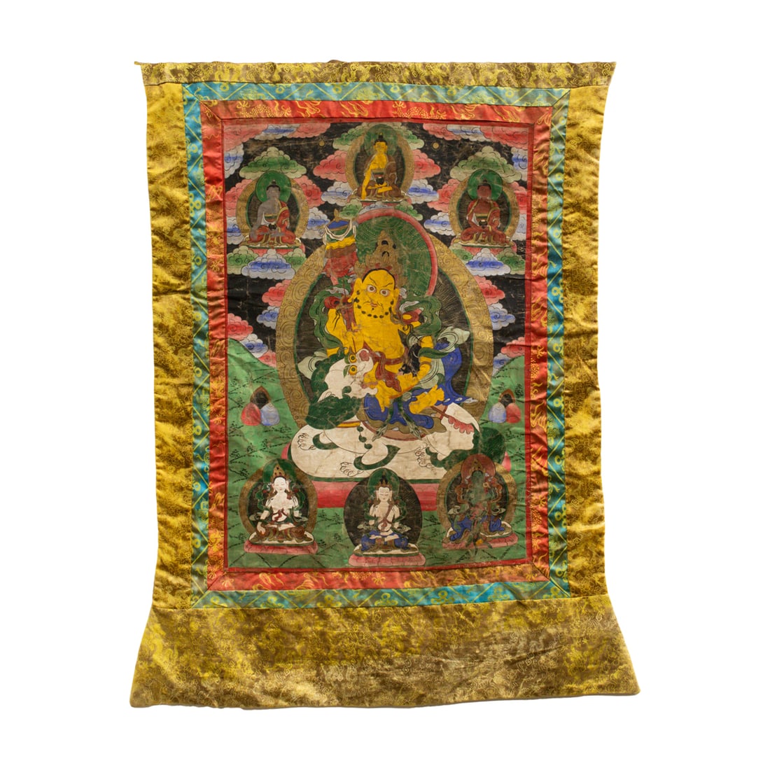 A Tibetan thangka: A Tibetan thangka. Distemper on cloth, 20th century, 29"h x 19.5"w.