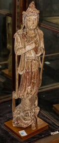 A Chinese polychrome wood figure of Guanyin