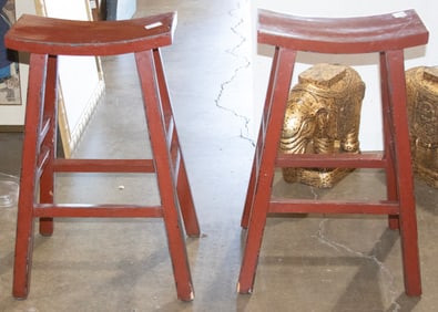 A pair of Chinese red painted stools
