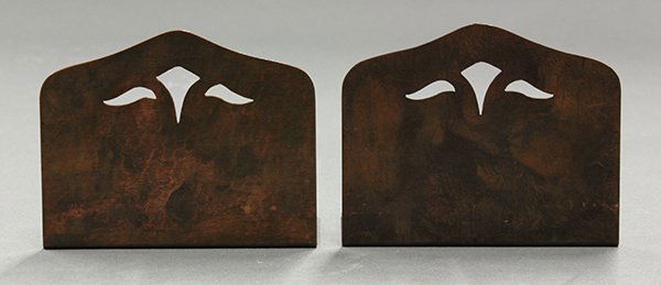 Pair of Dirk Van Erp bookends: Pair of Dirk Van Erp bookends, early 20th century. Executed in hammered copper with pierced floral decoration. Each with impressed mark for Dirk van Erp with windmill over San Francisco and Dirk van E