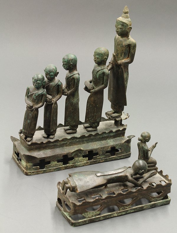 Two Thai Bronze Figural Buddhist Sculptures: Thai two-piece bronze Buddhist figural group, 18th/19th century, featuring the Buddha with his disciples crossing the Iraniya river, together with a prostrate monk providing a way for the Buddha to cr