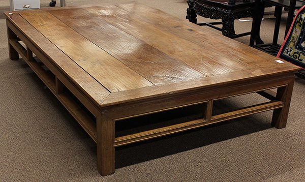 Thai/Chinese Wood Bed: Thai/Chinese wooden low bed, the top consisting of four floating panels within a plain edge, the short supports joined to beaded stretchers, 15.5"h x 80"w x 48.75"d