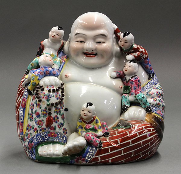 Chinese Porcelain Budai with Children: Chinese enameled porcelain figure of Budai, the Buddhist monk seated in laliasana and accompanied by five boys, the base marked 'Fujian Huiguan', 12"h