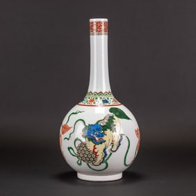 A Wucai Porcelain Bottle Vase Decorated With Buddhist Lions