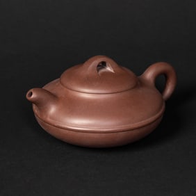 A Zisha Teapot with Cover
