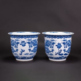 A Pair of Chinese Blue and White 'Dragon Playing Flame' Jars