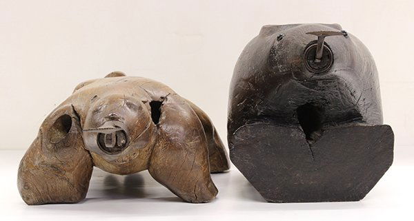 Two Thai Rabbit Form Coconut Graters: (lot of 2) Thai wooden coconut graters, one of a root wood rabbit; the other with a rounded body above a plinth, each fitted with metal graters, 26.75"l