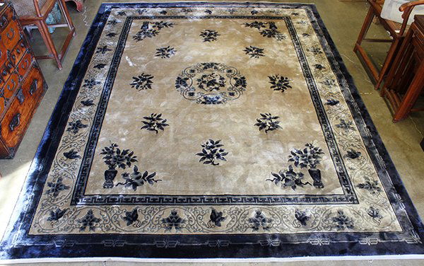 Chinese blue and brown art silk rug with plants and flo: Chinese blue and brown art silk rug with plants and flowers, 10'1" x 8'