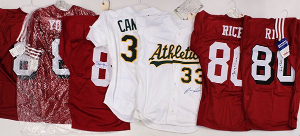 Autographed Sports Jerseys: (lot of 7) Autographed sports jerseys includig (2) Jerry Rice for San Francisco 49ers, (2) Jose Canseco for the Oaklands As, Steve Young for San Francisco 49ers, together with two unsigned Steve Young