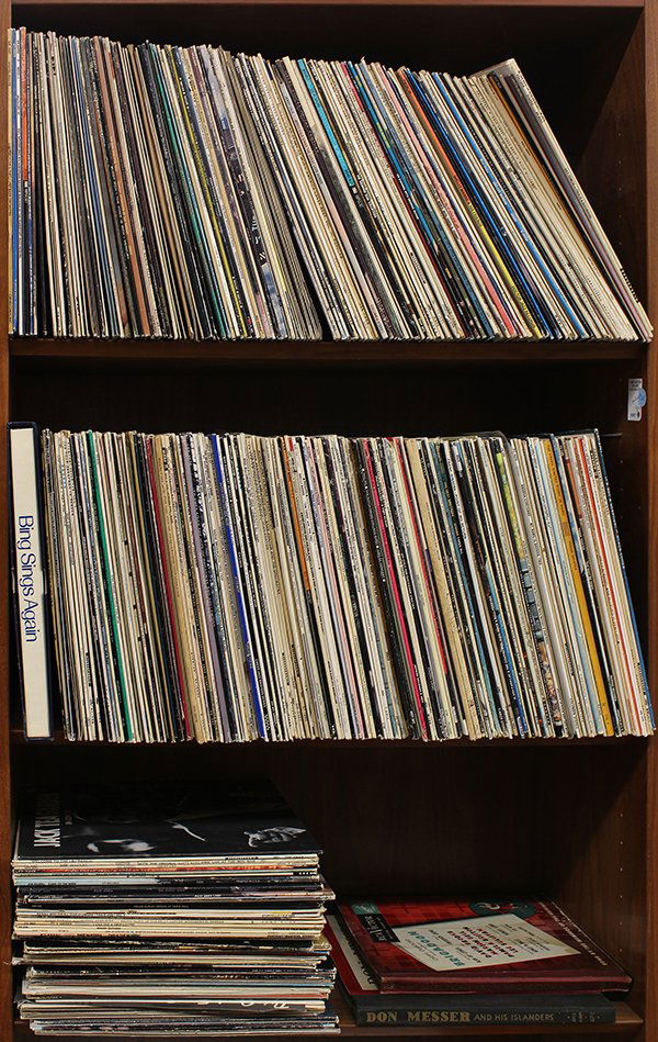 Three shelves of records by Jazz greats and crooners: Three shelves of records by Jazz greats and crooners including Jerri Winters, Frank Sinatra, Barbara Streisand, Jack Teagarden, Jack Douglas, Paul Anka, Stan Kenton, and Wild Bill, etc