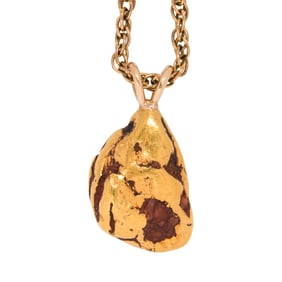 A natural gold nugget and 14k gold pendant