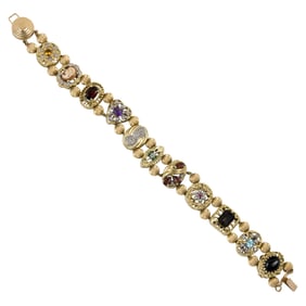 A gemstone and 10k bi-color gold slide bracelet