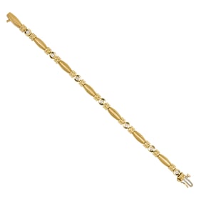 A diamond and 14k gold bracelet