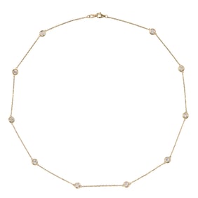 A diamond and 14k gold necklace