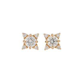 A pair of diamond and 14k gold stud earrings