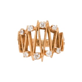 A diamond and 18k gold ring