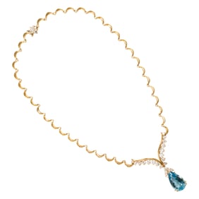 An aquamarine, diamond, and 18k gold necklace