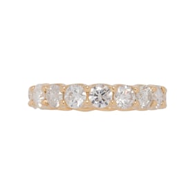 A diamond and 14k eternity band