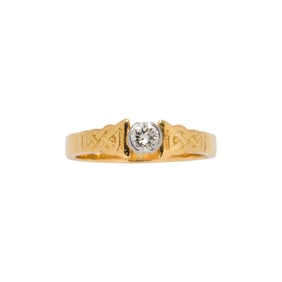 A diamond and 18k bi-color gold ring