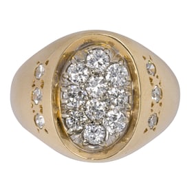 A diamond and 14k gold ring