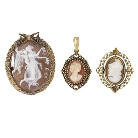 Three gold and shell cameos