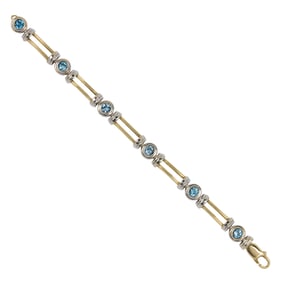 A topaz and 14k bi-color gold bracelet