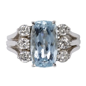 An aquamarine, diamond, and 18k white gold ring