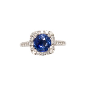 A sapphire, diamond and 14k white gold ring