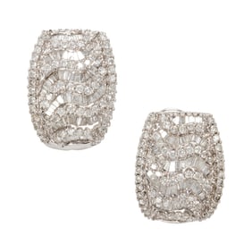 A pair of diamond and 14k white gold earrings