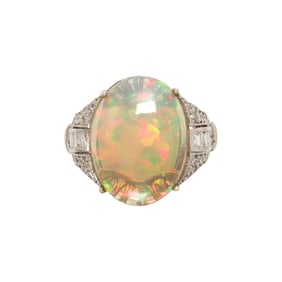 An opal, diamond, and platinum ring
