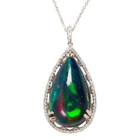 A black opal, diamond, and 14k white gold pendant necklace