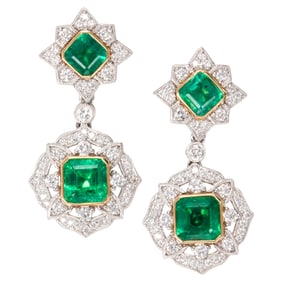 A pair of emerald, diamond, and platinum drop earrings