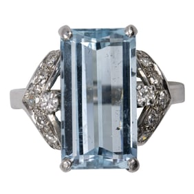 An aquamarine, diamond, and 18k white gold ring