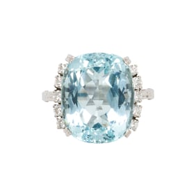 An aquamarine, diamond, and 14k gold ring