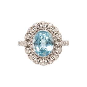 An aquamarine, diamond and 14k white gold ring