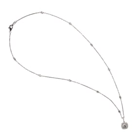 A diamond and white gold pendant necklace