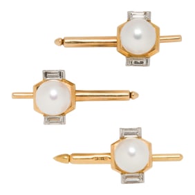 Three Cartier cultured pearl, diamond, and 18k bi-color shirt studs