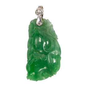 A jade, diamond, and 14k white gold pendant