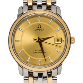 An Omega Prestige stainless steel wrist watch