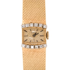 An Omega diamond and 14k gold ladies dress watch, circa 1966