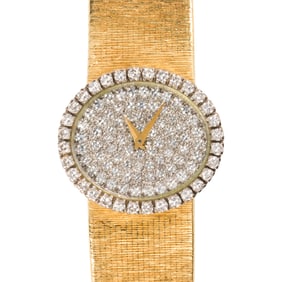A Baume & Mercier diamond and 18k gold wristwatch