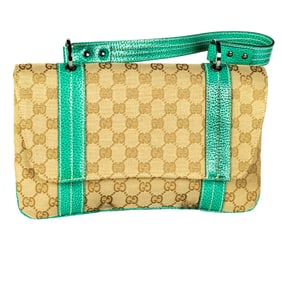 A vintage Gucci monogram canvas shoulder bag with turquoise leather trim