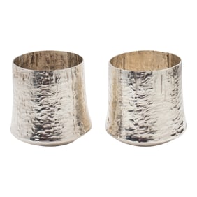 A pair of Finnish Brutalist sterling beakers