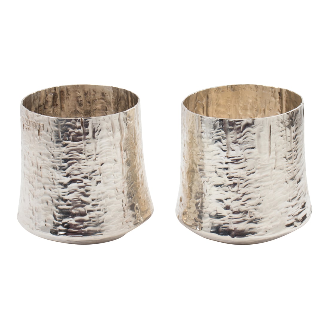 A pair of Finnish Brutalist sterling beakers